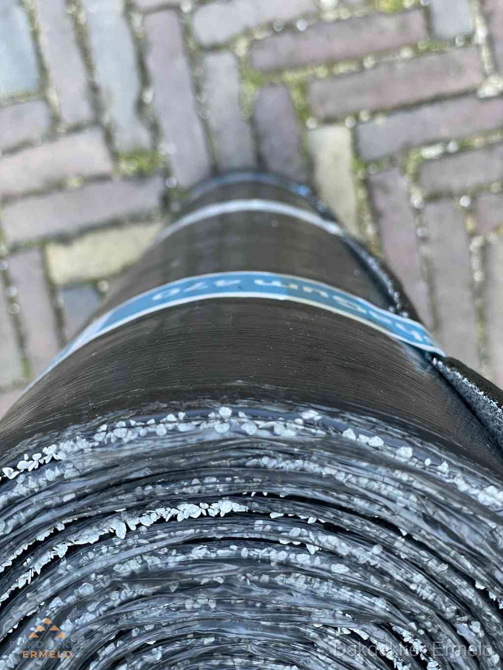 Rol bitumen dakleer met leislag voor plat dak in Ermelo Rol bitumen dakleer met leislag voor plat dak in Ermelo
